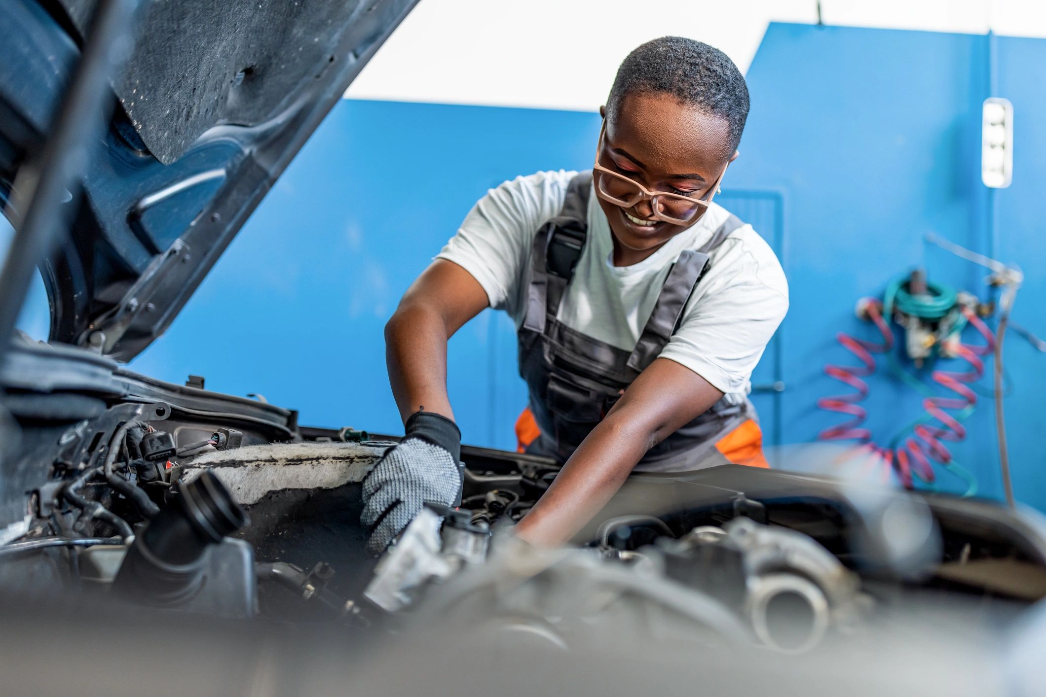 ASE certified mechanic working